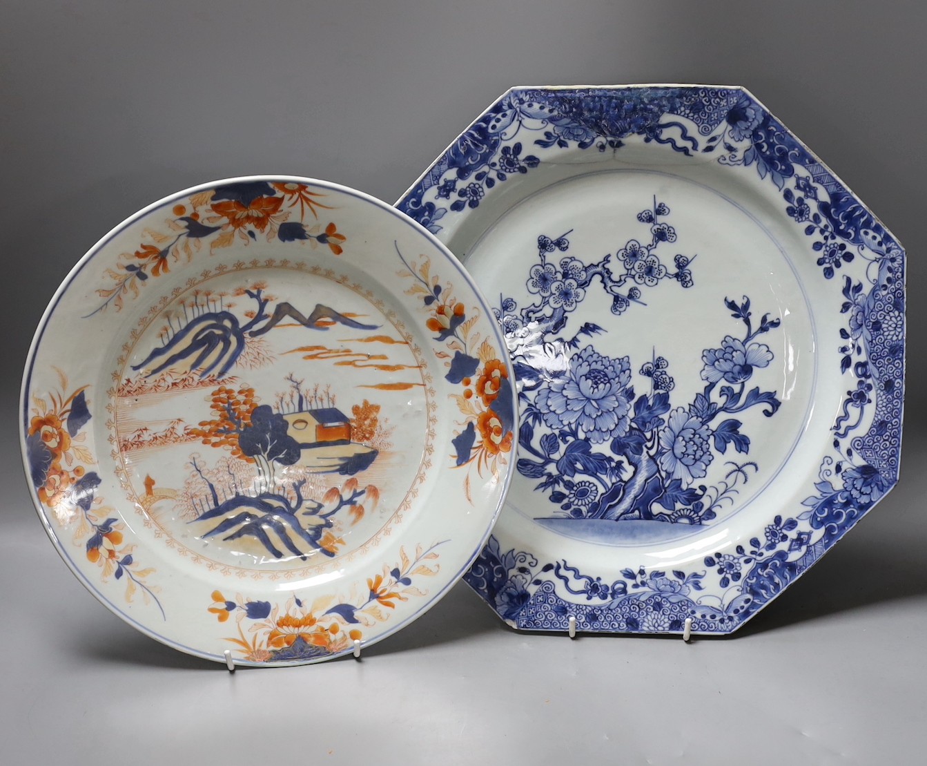 A Chinese blue and white octagonal plate with botanical decoration, together with another Chinese Imari plate with landscape decoration, 31cm diameter